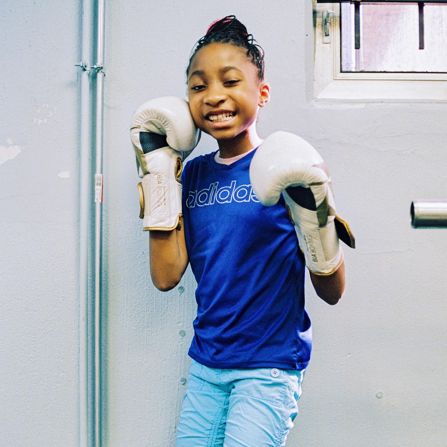 A young Bloc athlete smiles in training